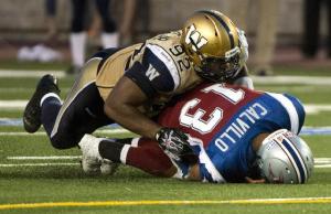 Anthony Calvillo has been pushed around by opposing defences through the first, 4 games of the CFL season. (Paul Chiasson/The Canadian Press)